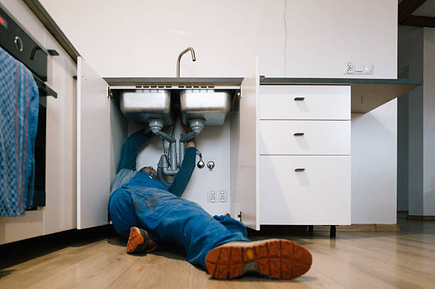 Professional Emergency Plumber technician working in Houston, AK